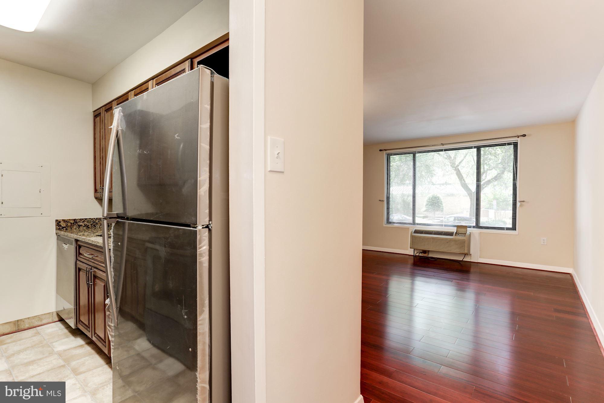 2501 Calvert Street Northwest, Unit 110 Washington, DC 20008 - Photo 7 of 28 View to Kitchen and Living Room/Dining Room Combo