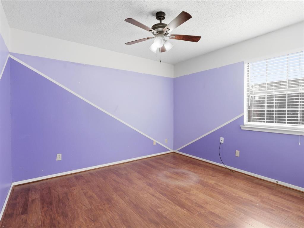 701 College Street Celeste, TX 75423 - Photo 18 of 29 a view of an empty room with a window