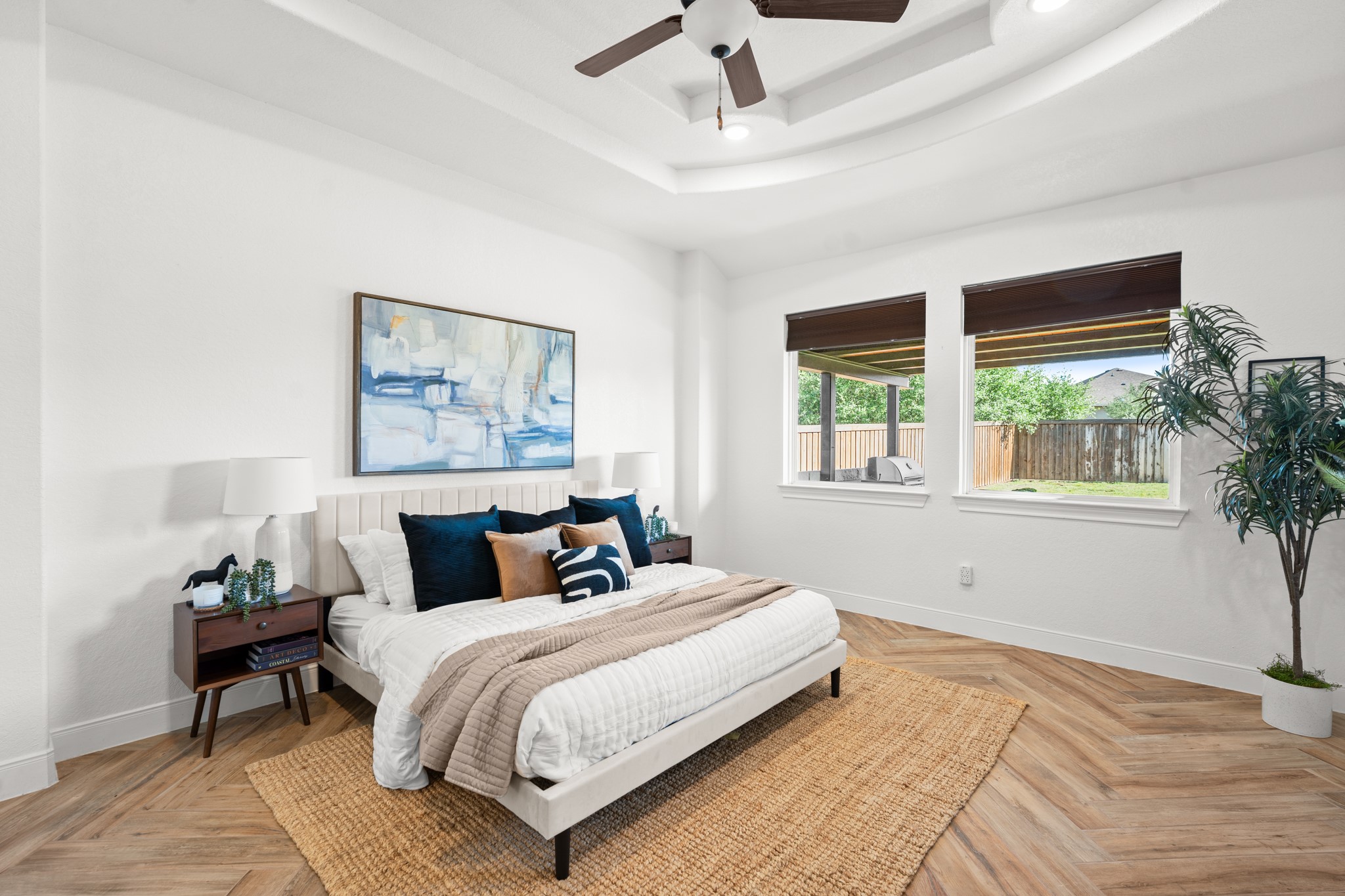 128 Hiram Cook Blanco, TX 78606 - Photo 10 of 40 Bedroom featuring a tray ceiling with recessed lighting and a ceiling fan