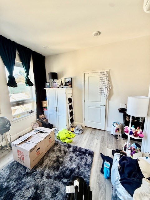 5 Fremont Street, Unit 301 Winthrop, MA 02152 - Photo 11 of 18 a living room with furniture and a window