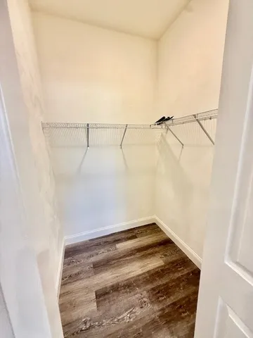 a view of a room with racks on the wall