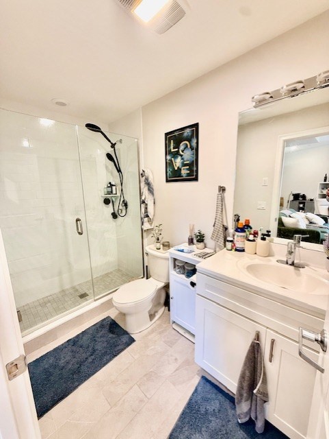 5 Fremont Street, Unit 301 Winthrop, MA 02152 - Photo 18 of 18 a spacious bathroom with a sink a toilet a mirror and shower