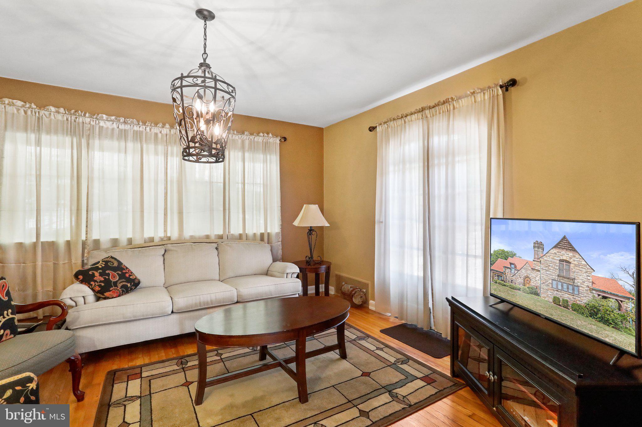 815 Windsor Road Cumberland, MD 21502 - Photo 7 of 46 Lovely sitting room with access to the patio!