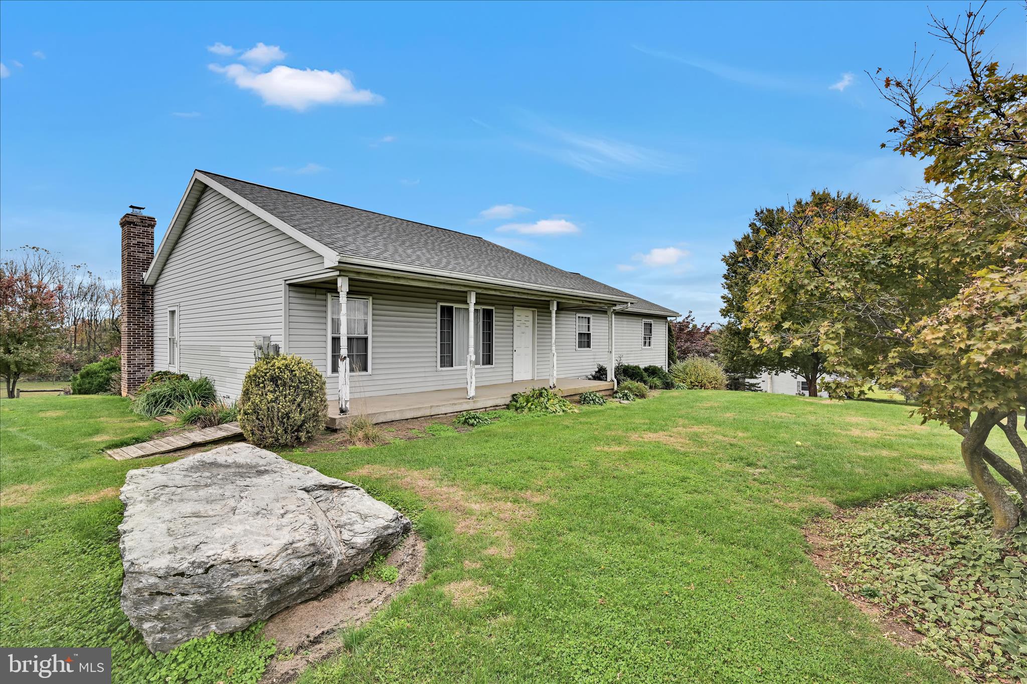 188 Lengle Road Myerstown, PA 17067 - Photo 12 of 58 a backyard of a house with plants and large tree