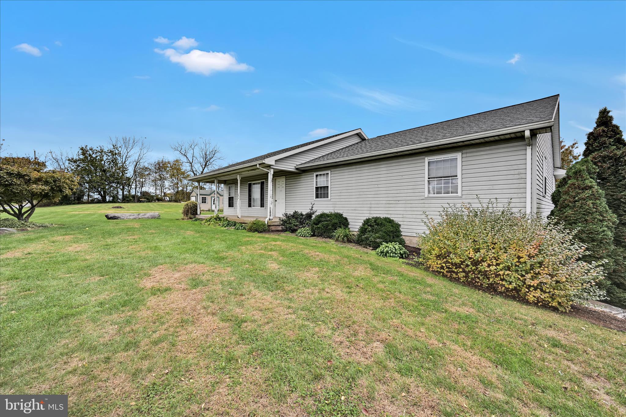 188 Lengle Road Myerstown, PA 17067 - Photo 13 of 58 a backyard of a house with plants and tree