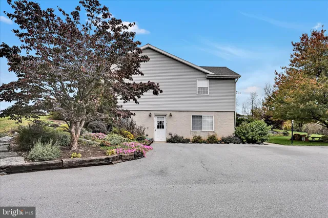 a outdoor space with lots of furniture and shower