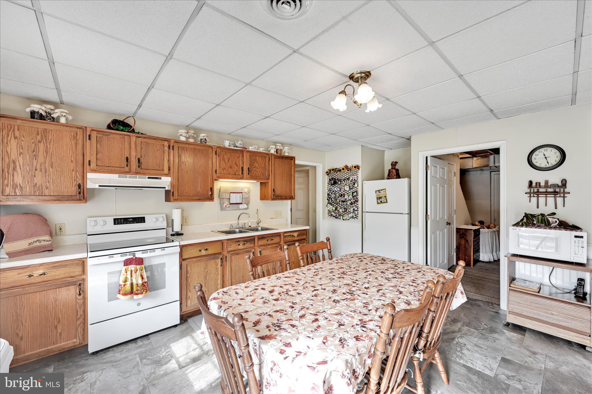 188 Lengle Road Myerstown, PA 17067 - Photo 17 of 58 a kitchen with stainless steel appliances granite countertop a sink stove and refrigerator