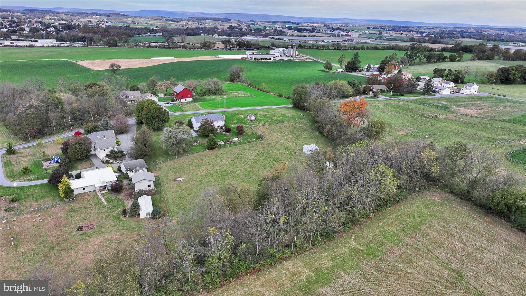 188 Lengle Road Myerstown, PA 17067 - Photo 2 of 58 a view of a garden with a lot of flower plants and mountain view in back