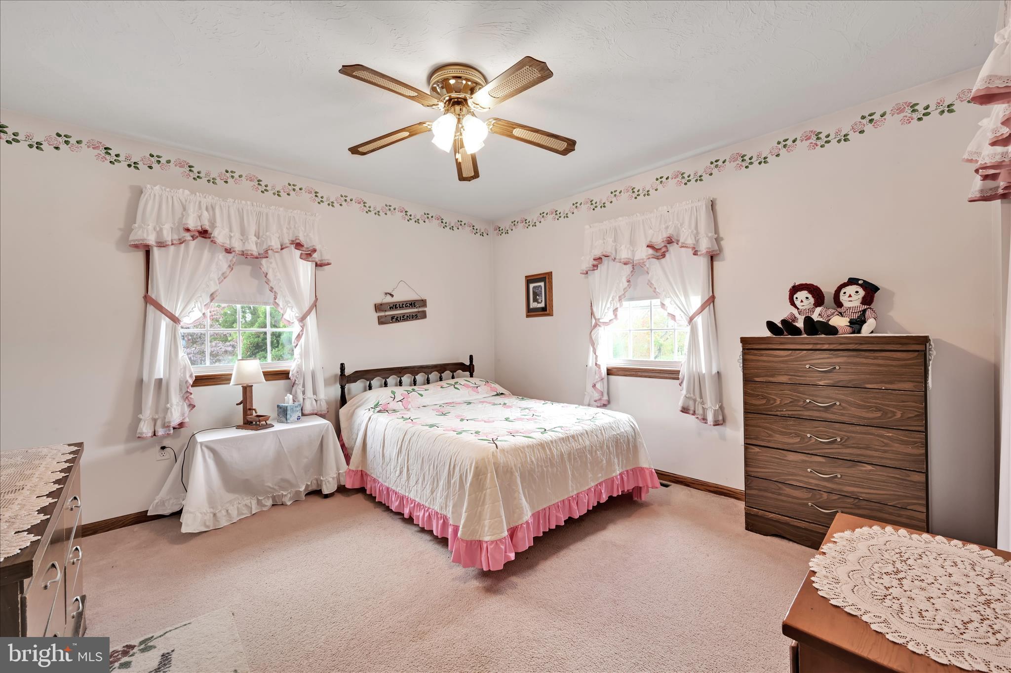 188 Lengle Road Myerstown, PA 17067 - Photo 22 of 58 a bedroom with a bed and a chandelier