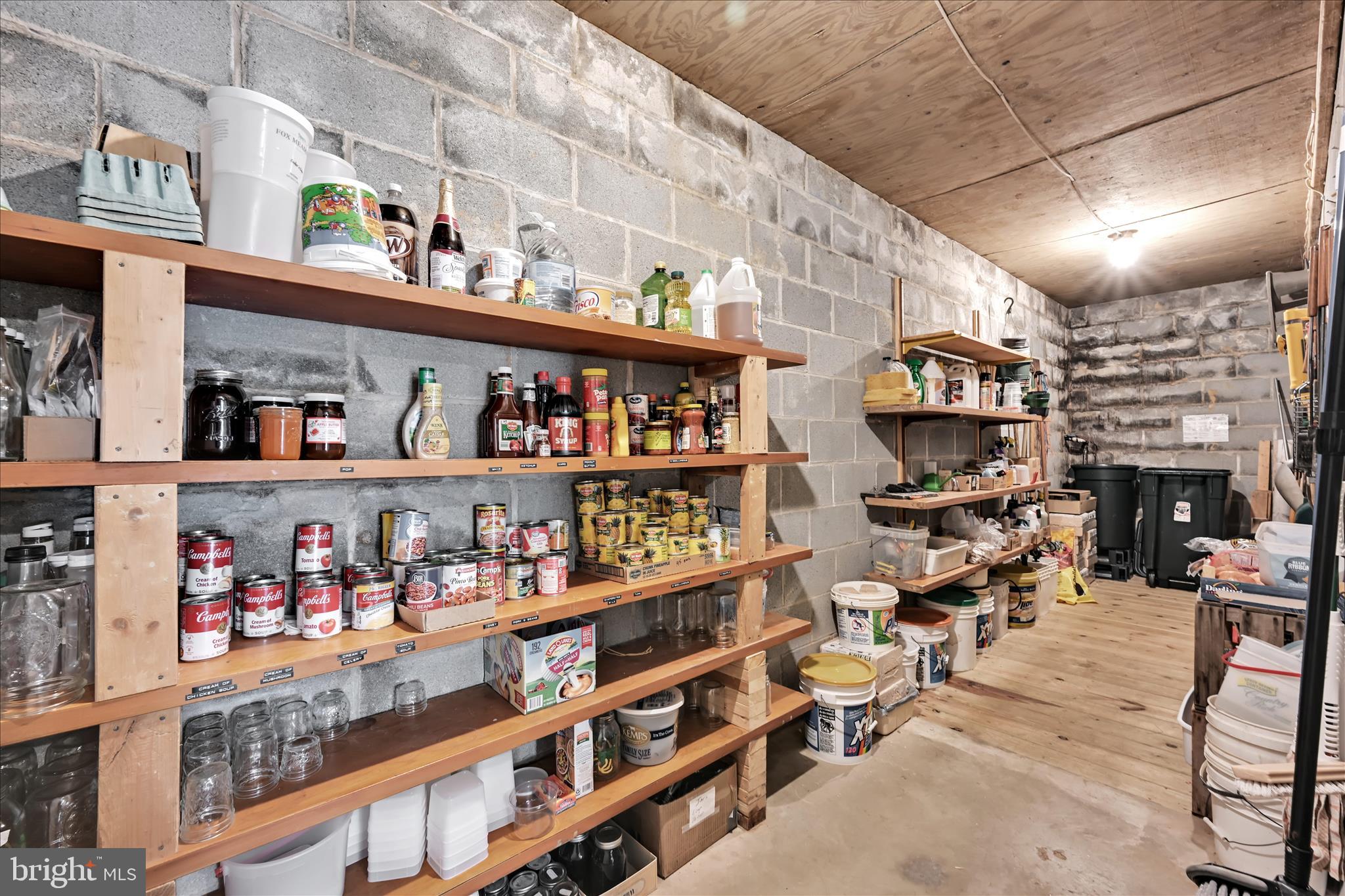 188 Lengle Road Myerstown, PA 17067 - Photo 39 of 58 a living room with lots of furniture and a book shelf