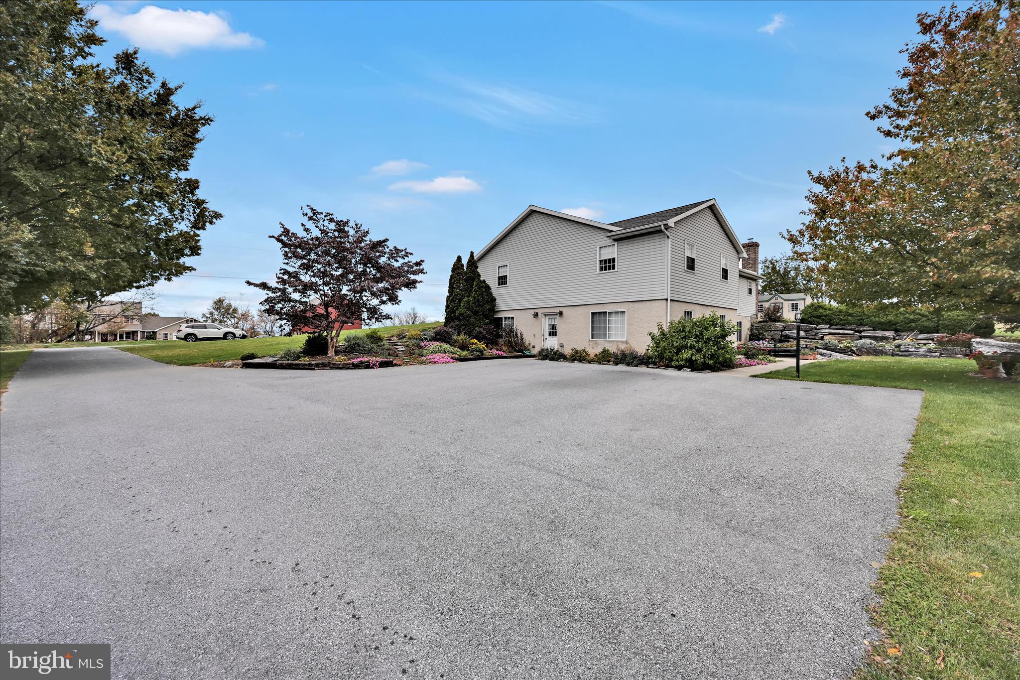 188 Lengle Road Myerstown, PA 17067 - Photo 42 of 58 a front view of a house with a yard and garage
