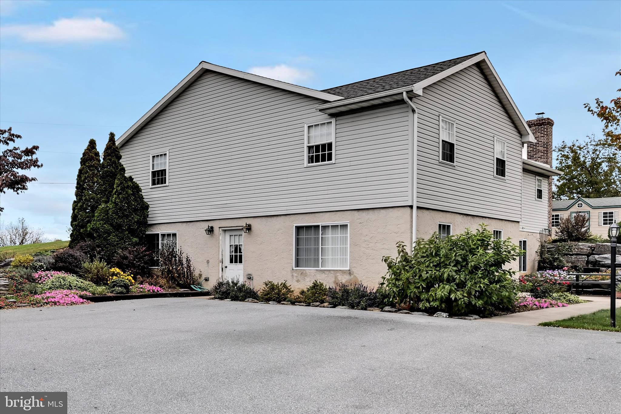 188 Lengle Road Myerstown, PA 17067 - Photo 43 of 58 a front view of a house with plants and trees