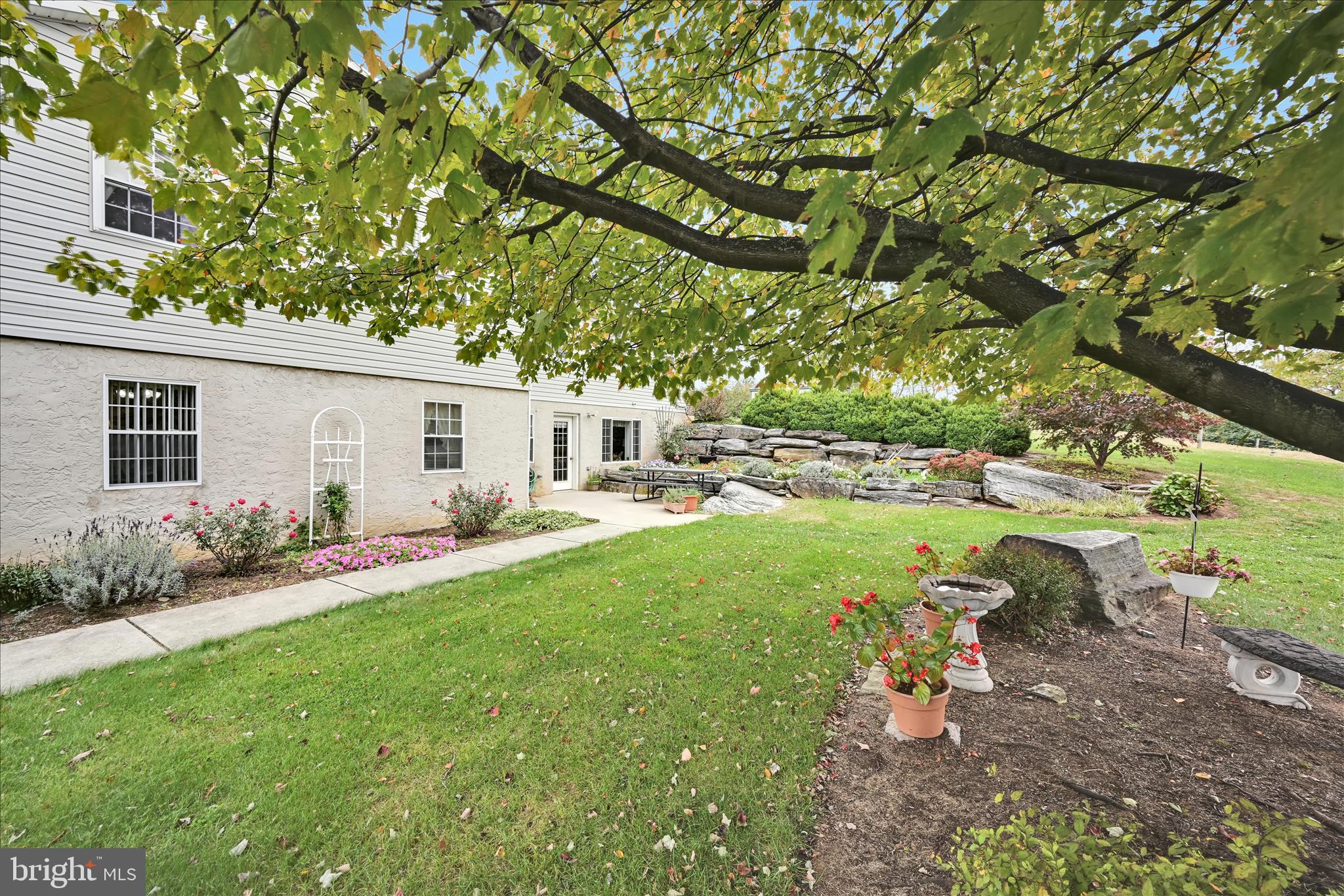 188 Lengle Road Myerstown, PA 17067 - Photo 44 of 58 a view of backyard of house with outdoor seating and green space