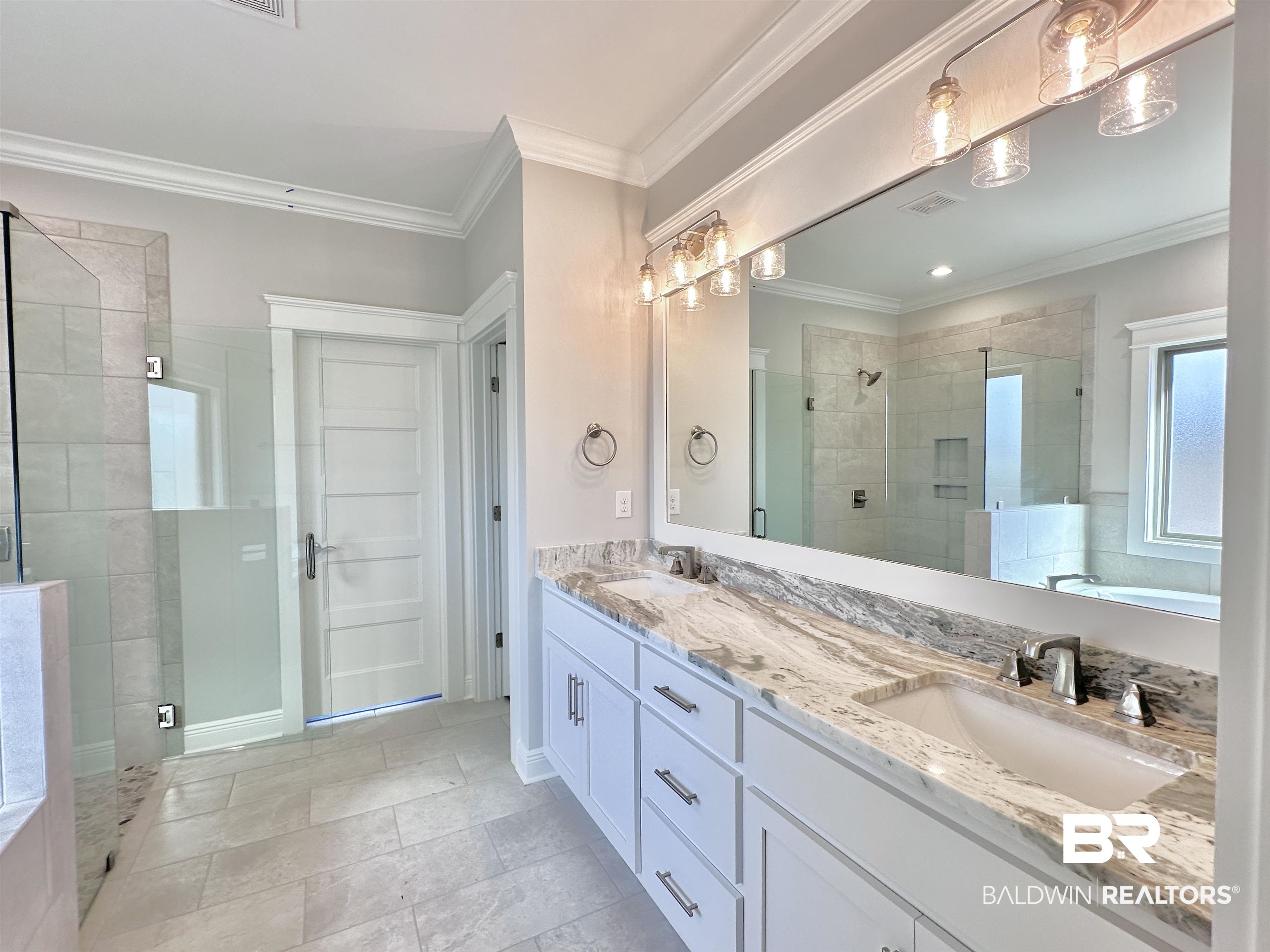 630 Kitfox Avenue Fairhope, AL 36532 - Photo 14 of 40 Bathroom with walk in shower, ornamental molding, and vanity