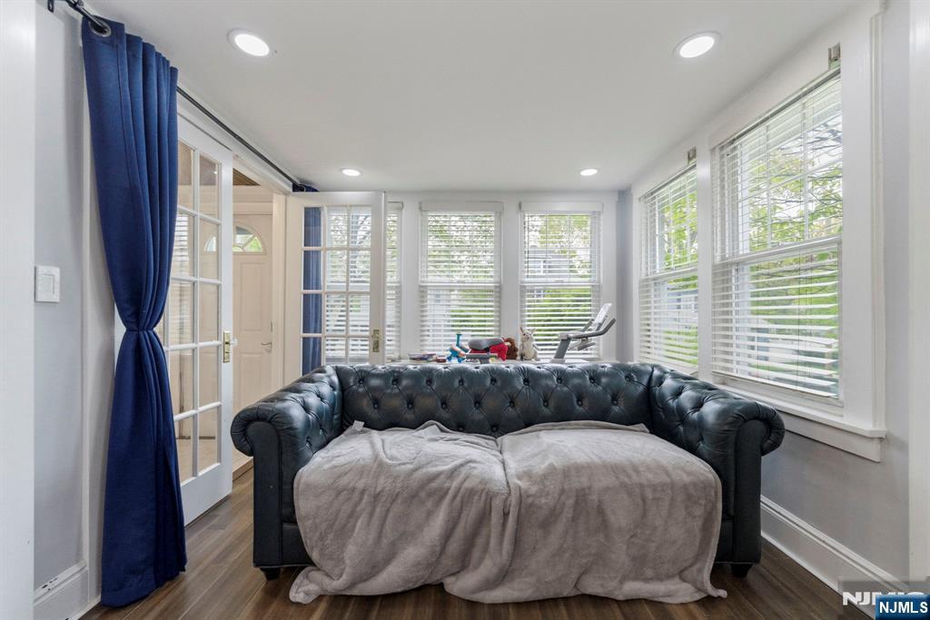 105 Daniel Avenue Rutherford, NJ 07070 - Photo 12 of 38 a bedroom with a bed and wooden floor