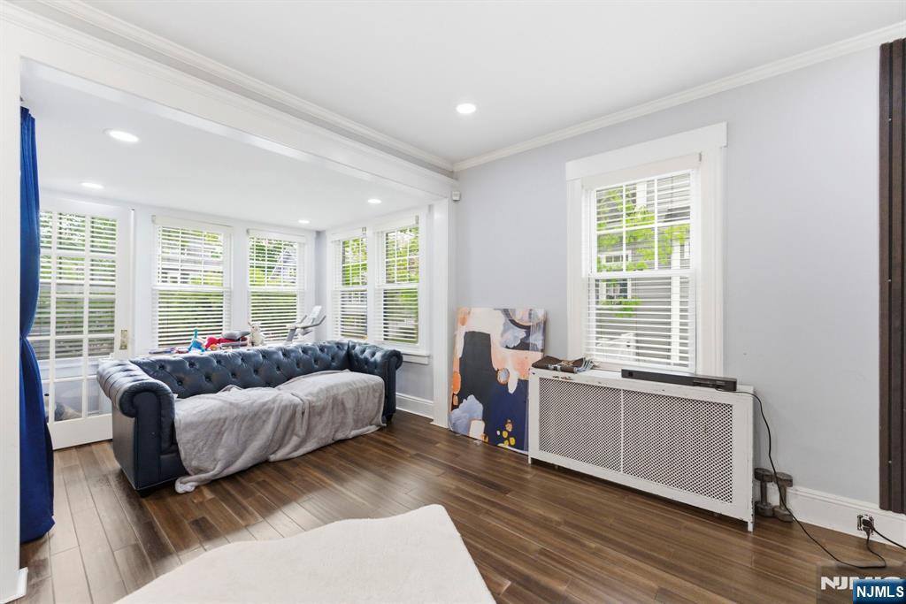 105 Daniel Avenue Rutherford, NJ 07070 - Photo 14 of 38 a living room with furniture and windows