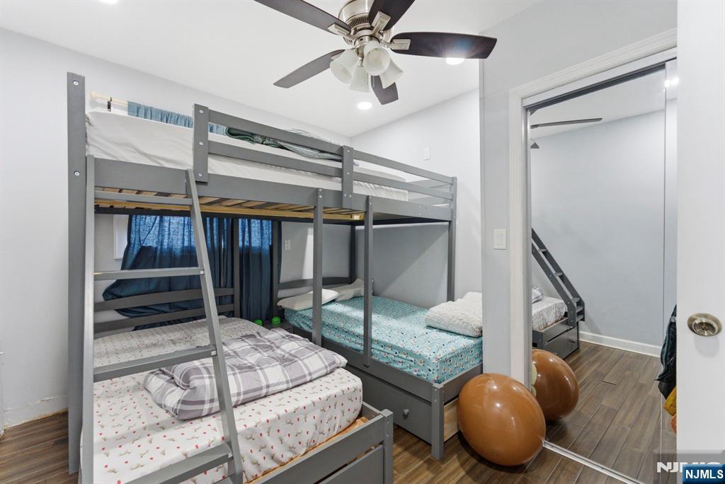 105 Daniel Avenue Rutherford, NJ 07070 - Photo 15 of 38 a bedroom with a bed and ceiling fan