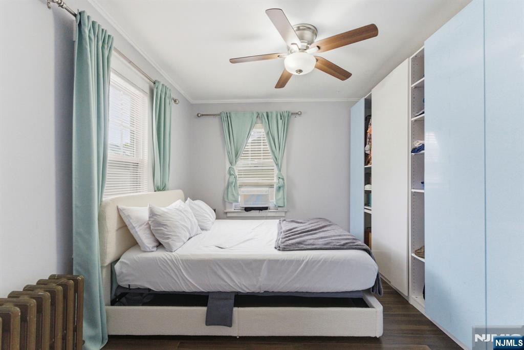 105 Daniel Avenue Rutherford, NJ 07070 - Photo 19 of 38 a bedroom with a large bed and a window