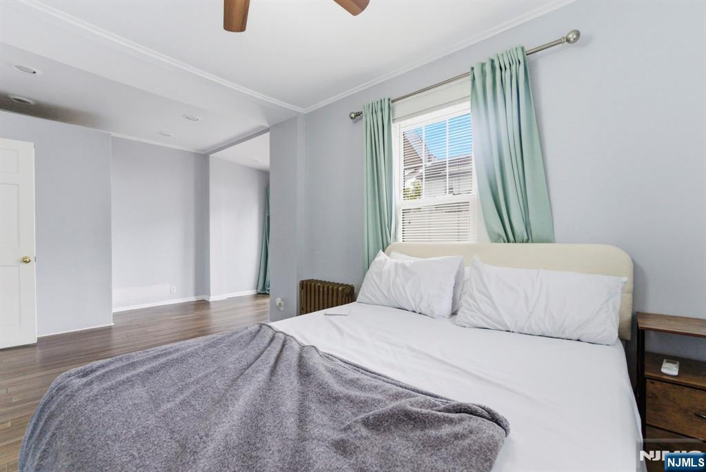 105 Daniel Avenue Rutherford, NJ 07070 - Photo 20 of 38 a bedroom with a bed and a mirror