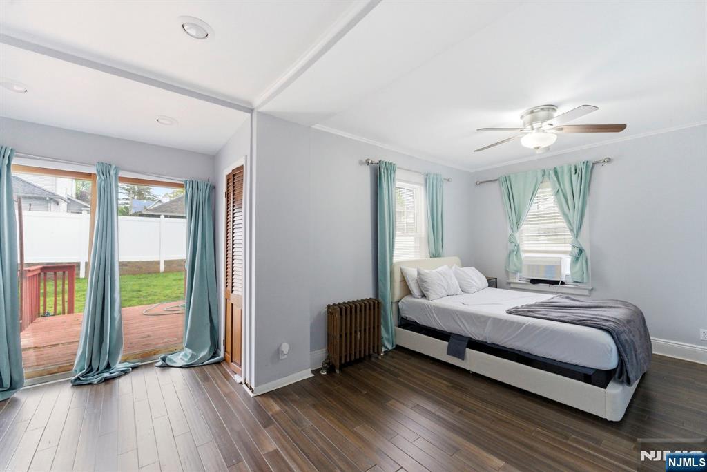 105 Daniel Avenue Rutherford, NJ 07070 - Photo 22 of 38 a bedroom with a bed and a large window