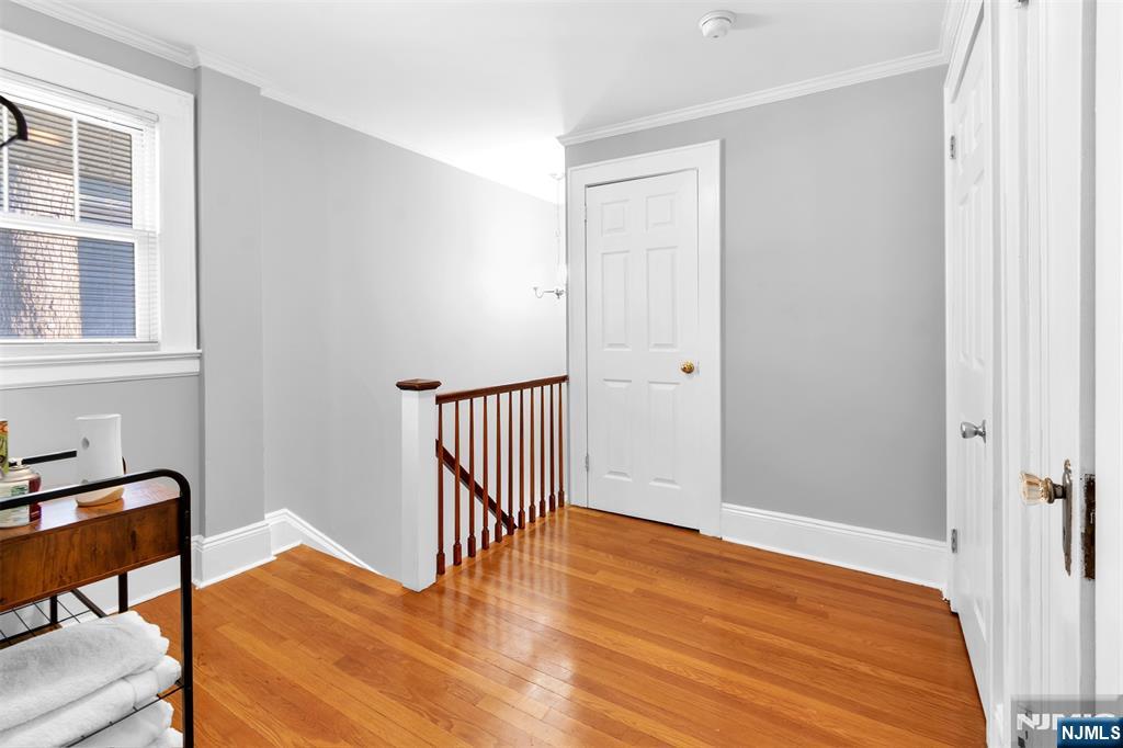 105 Daniel Avenue Rutherford, NJ 07070 - Photo 30 of 38 a view of a room with wooden floor and a window