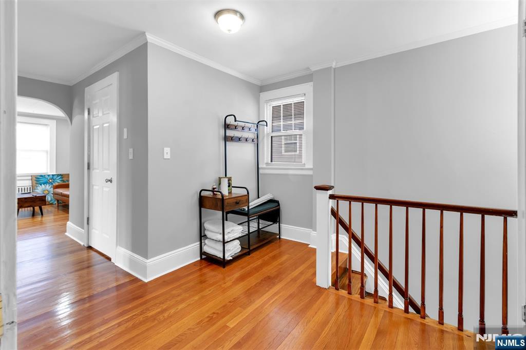 105 Daniel Avenue Rutherford, NJ 07070 - Photo 31 of 38 a view of a livingroom with wooden floor and furniture
