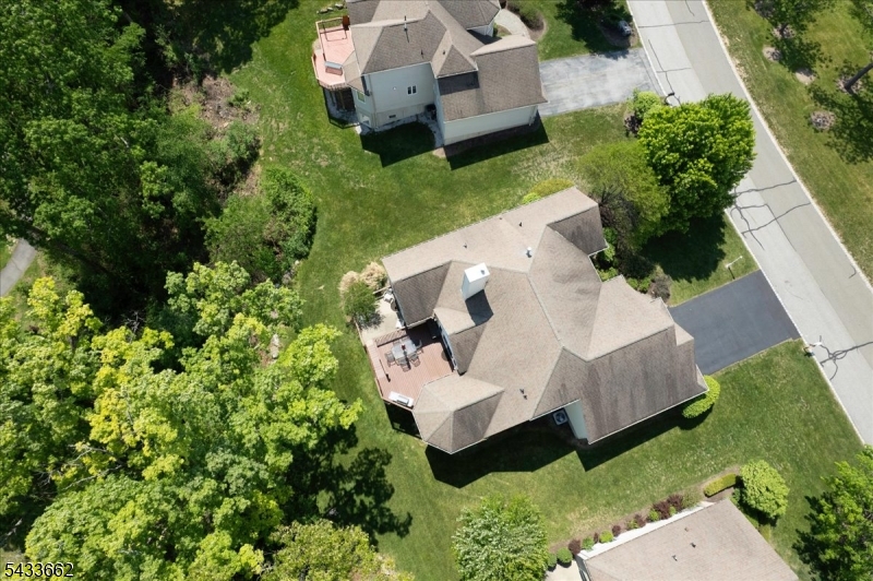 15 Bracken Hill Road Hamburg, NJ 07419 - Photo 38 of 44 an aerial view of a house with a yard and garden