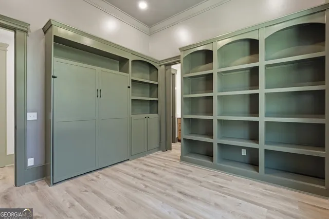 an aerial view of a house with a garden