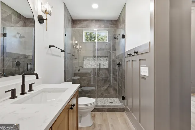 a view of a house with swimming pool and a yard