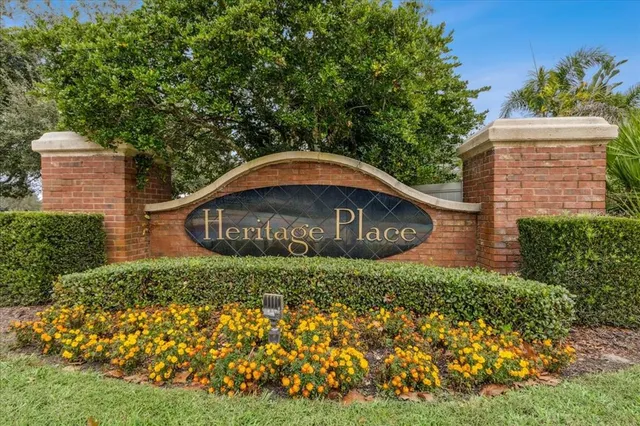 a view of a wooden house with a yard