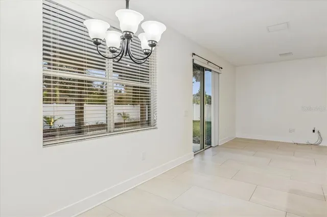 en view of empty room with wooden floor