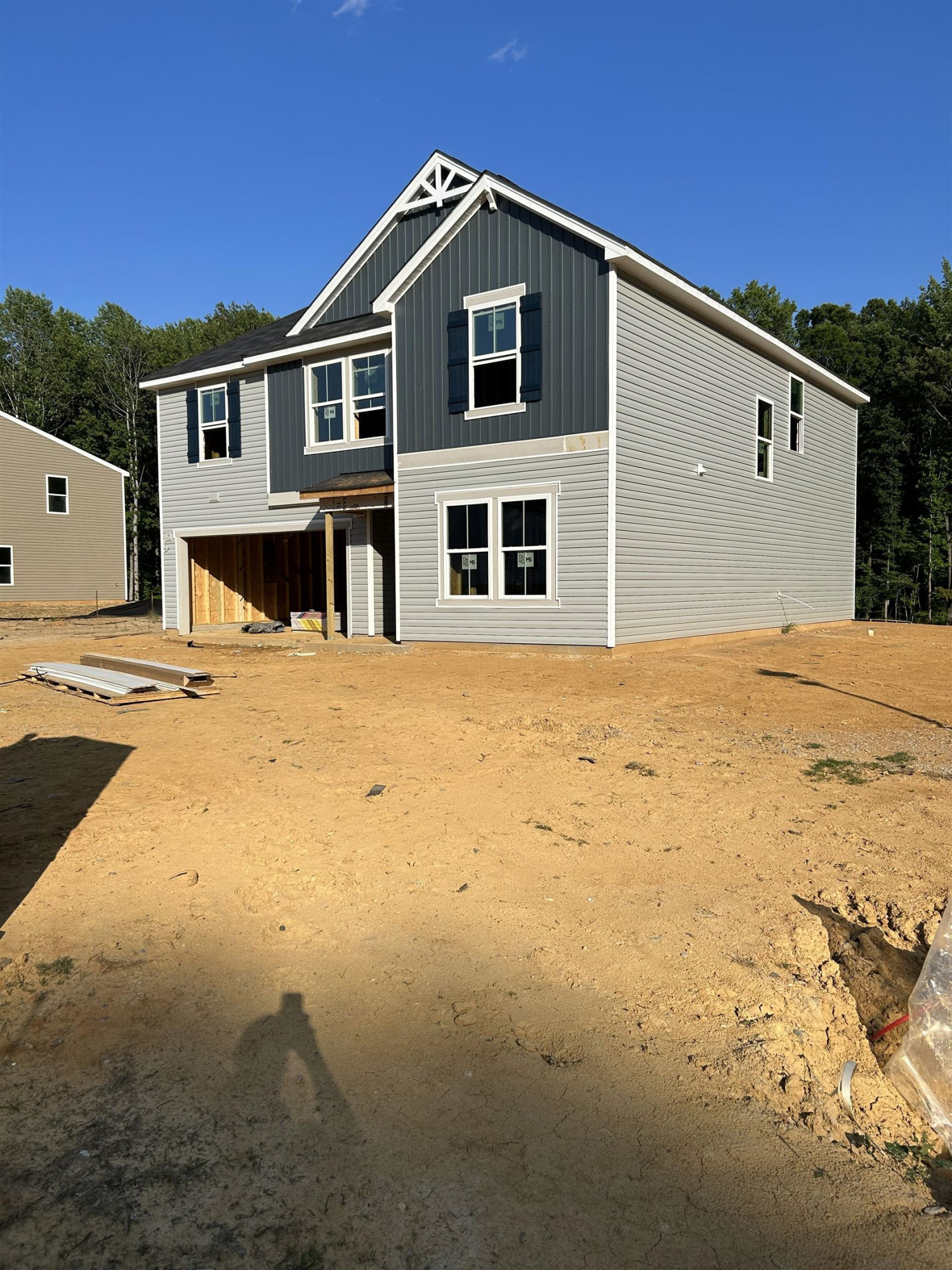 166 Riley Way Spring Hope, NC 27882 - Photo 12 of 14 a front view of a house with a yard