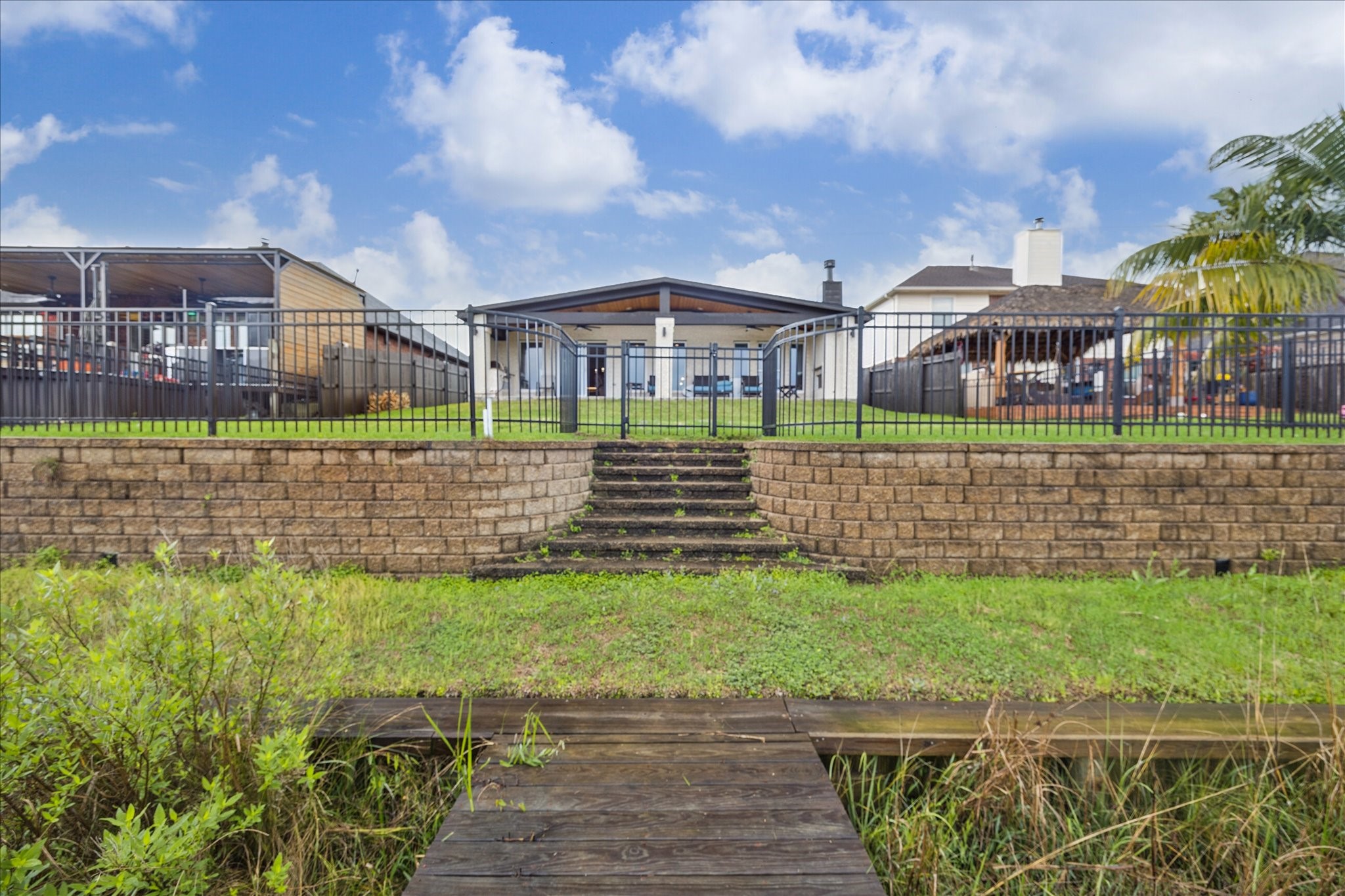 416 Twin Timbers Lane Kemah, TX 77565 - Photo 27 of 29 a front view of a house with a yard