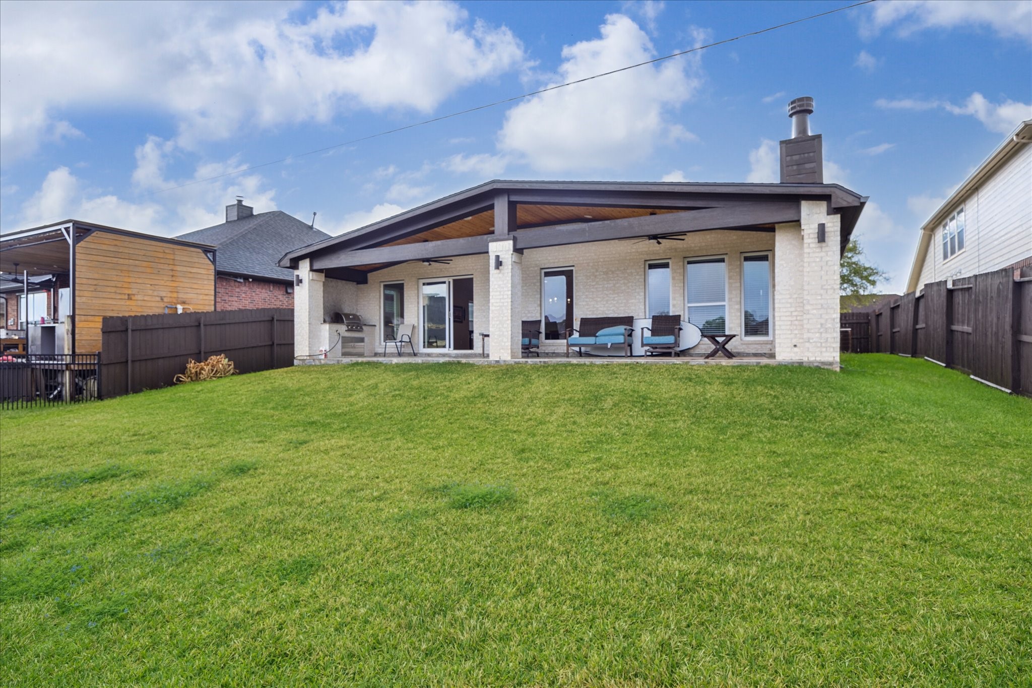 416 Twin Timbers Lane Kemah, TX 77565 - Photo 28 of 29 a view of a house with a big yard and large trees