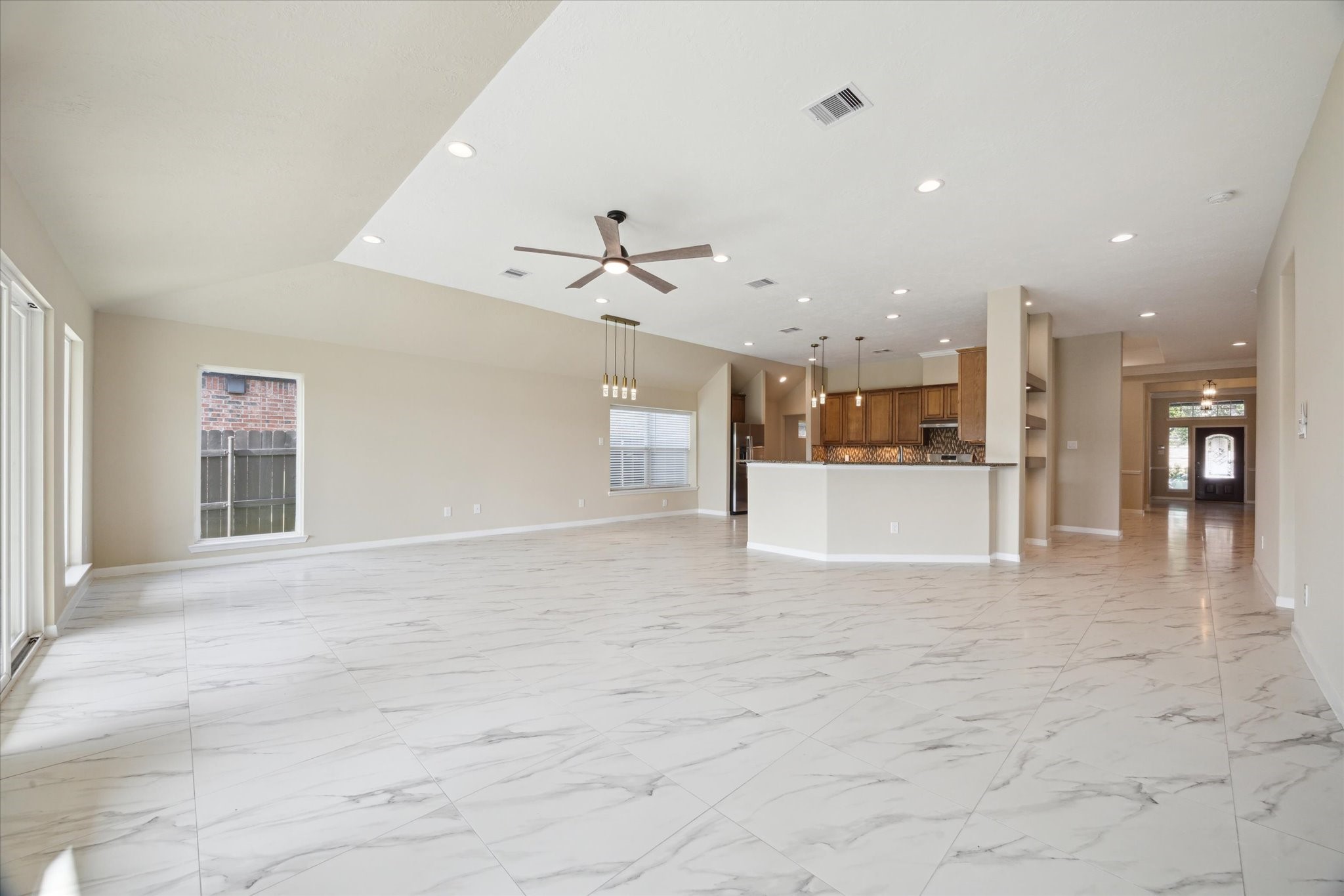 416 Twin Timbers Lane Kemah, TX 77565 - Photo 7 of 29 a view of a kitchen with a sink and a refrigerator