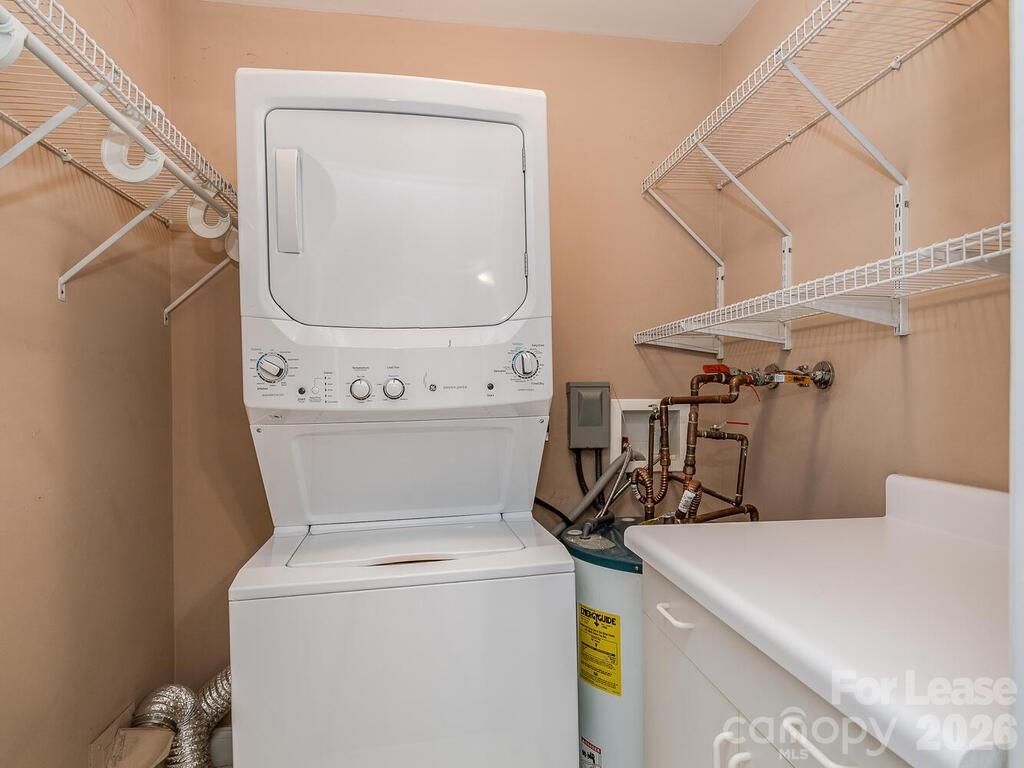 2600 Park Road, Unit D Charlotte, NC 28209 - Photo 19 of 22 a utility room with dryer and washer