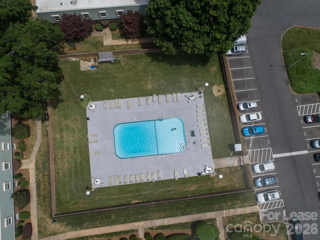 2600 Park Road, Unit D Charlotte, NC 28209 - Photo 22 of 22 an aerial view of a house with a garden and lake view