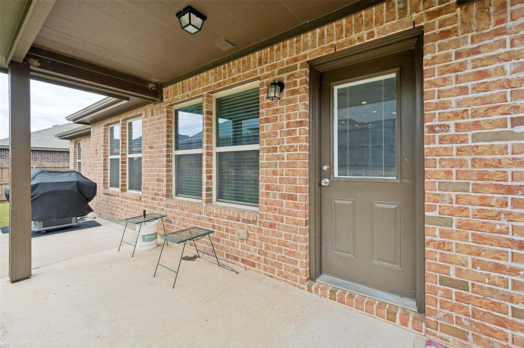 3905 Bridle Path Lane Sanger, TX 76266 - Photo 22 of 26 a building outdoor space with seating space