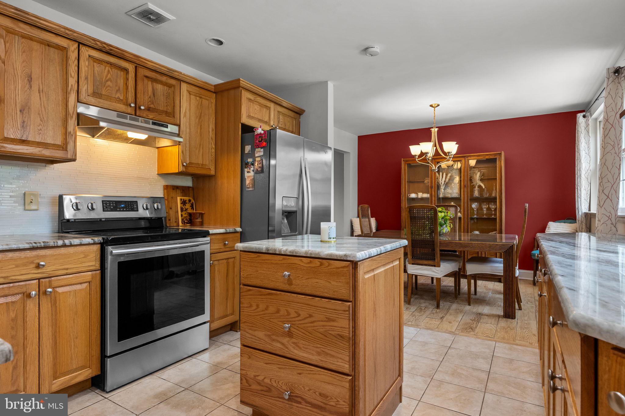 320 Pheasant Run Drive Doylestown, PA 18901 - Photo 11 of 47 a kitchen with a sink and cabinets