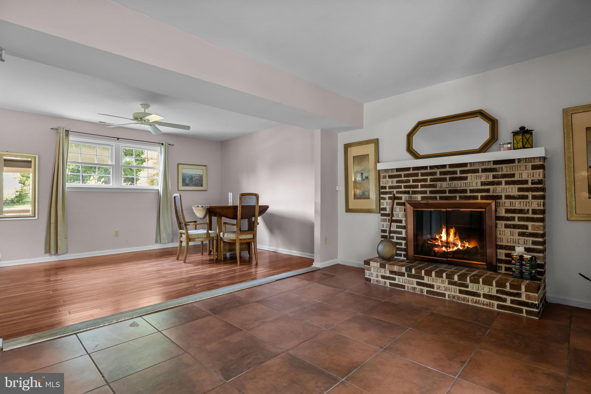 320 Pheasant Run Drive Doylestown, PA 18901 - Photo 13 of 47 a living room with furniture a fireplace and a window