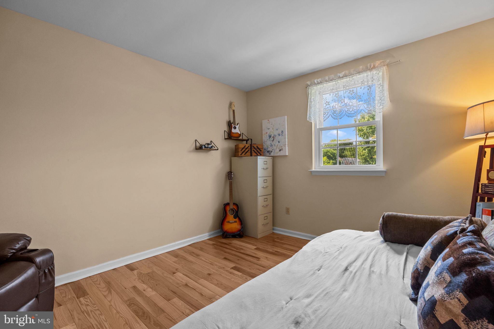 320 Pheasant Run Drive Doylestown, PA 18901 - Photo 20 of 47 a bedroom with a bed and a window