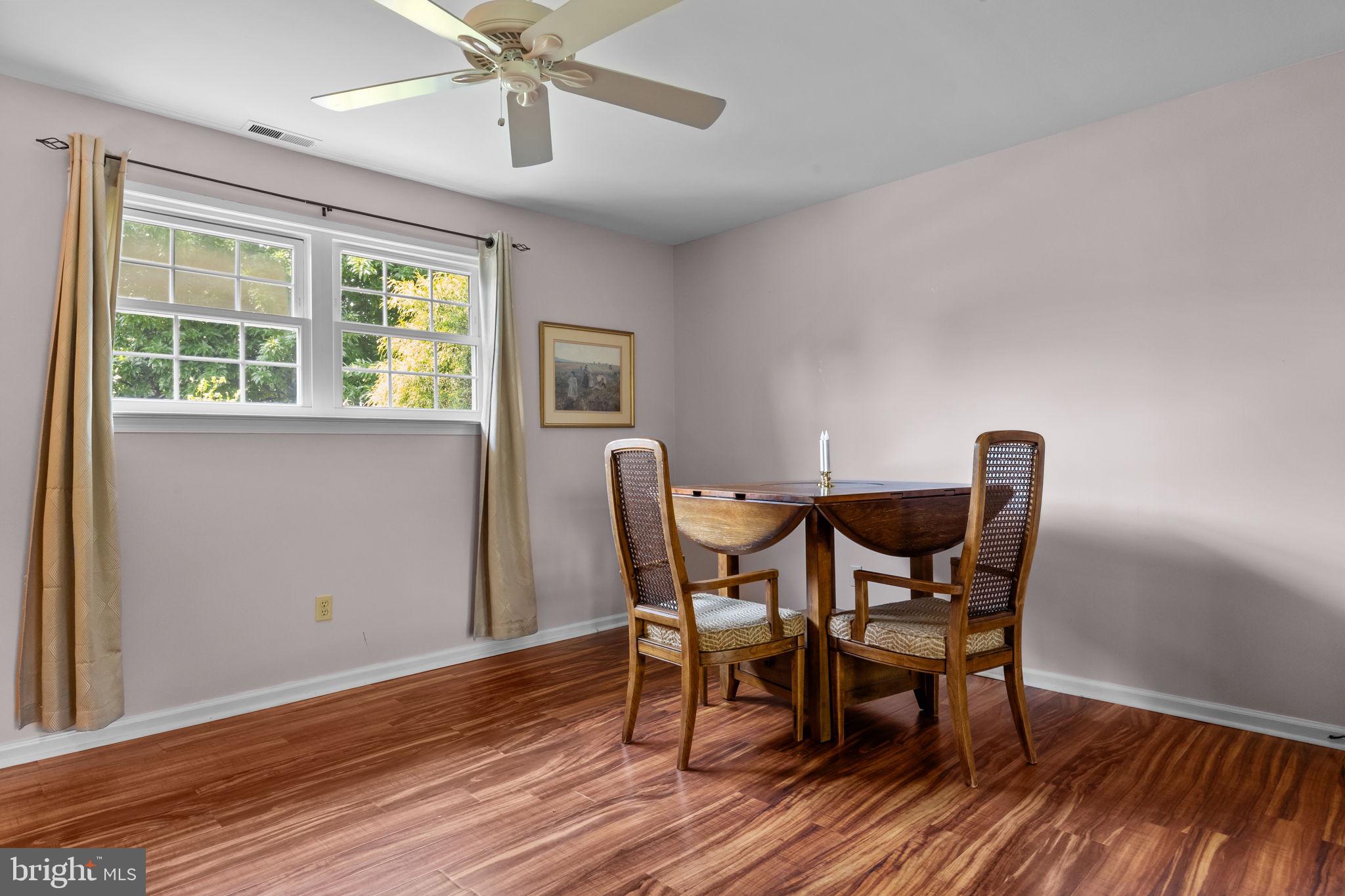 320 Pheasant Run Drive Doylestown, PA 18901 - Photo 24 of 47 a view of a dining room with furniture window and wooden floor