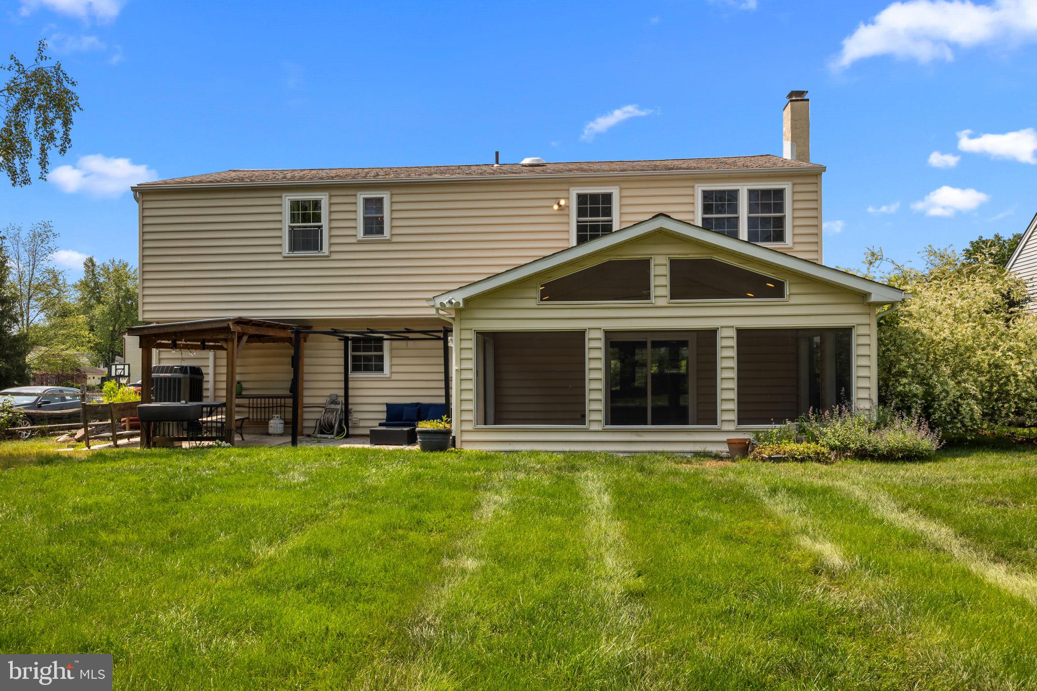 320 Pheasant Run Drive Doylestown, PA 18901 - Photo 35 of 47 a front view of a house with a yard