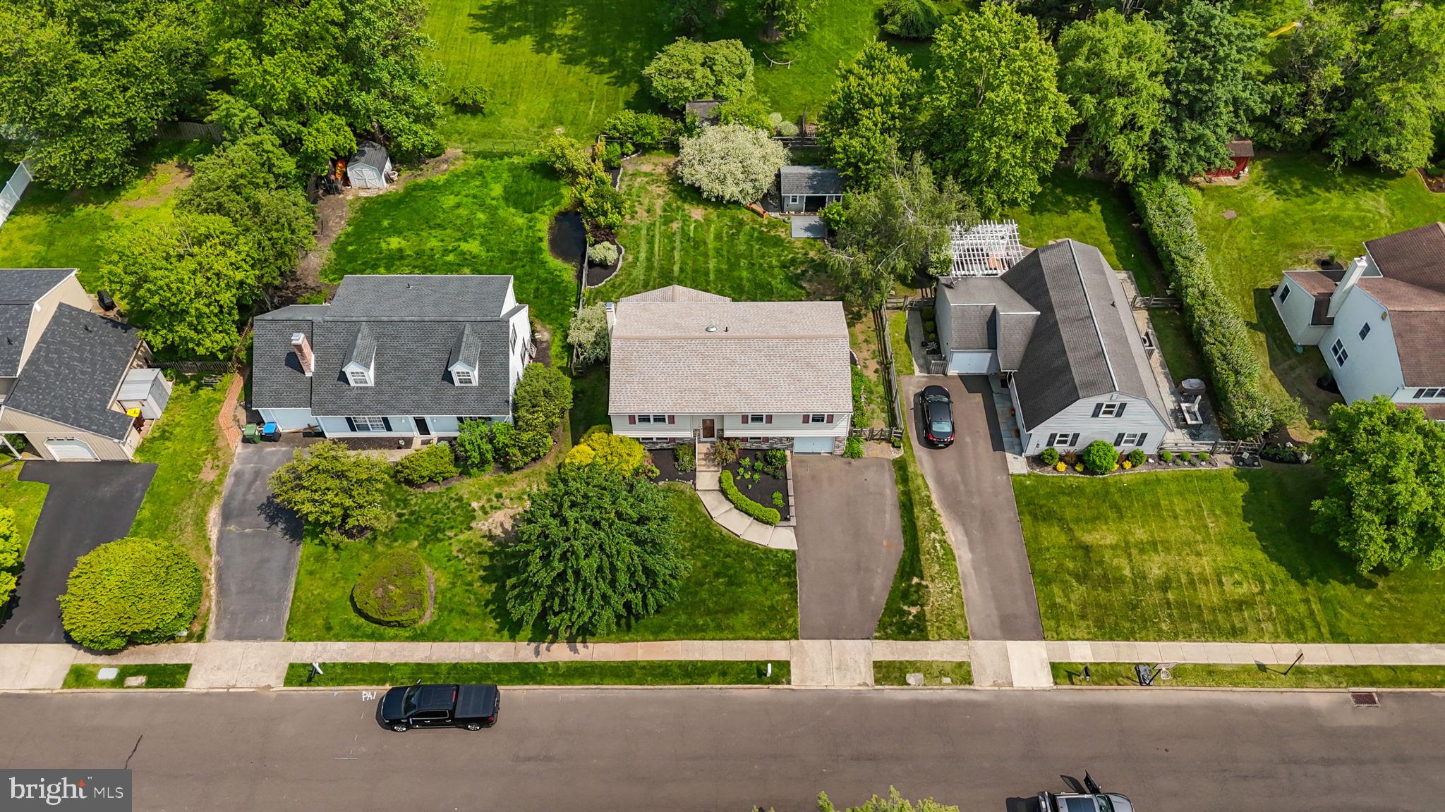 320 Pheasant Run Drive Doylestown, PA 18901 - Photo 38 of 47 an aerial view of a house with garden space and street view
