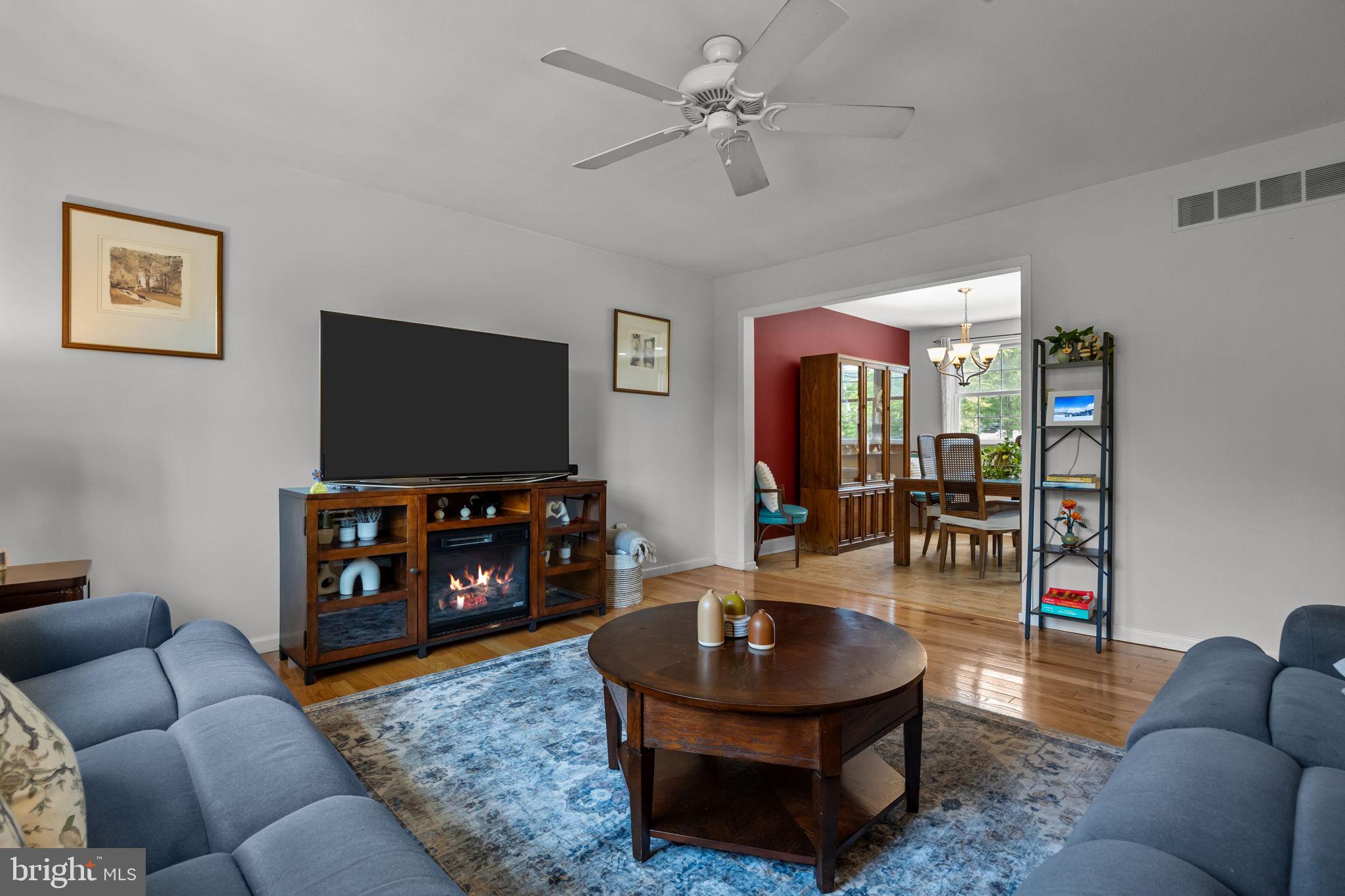 320 Pheasant Run Drive Doylestown, PA 18901 - Photo 7 of 47 a living room with furniture and a flat screen tv