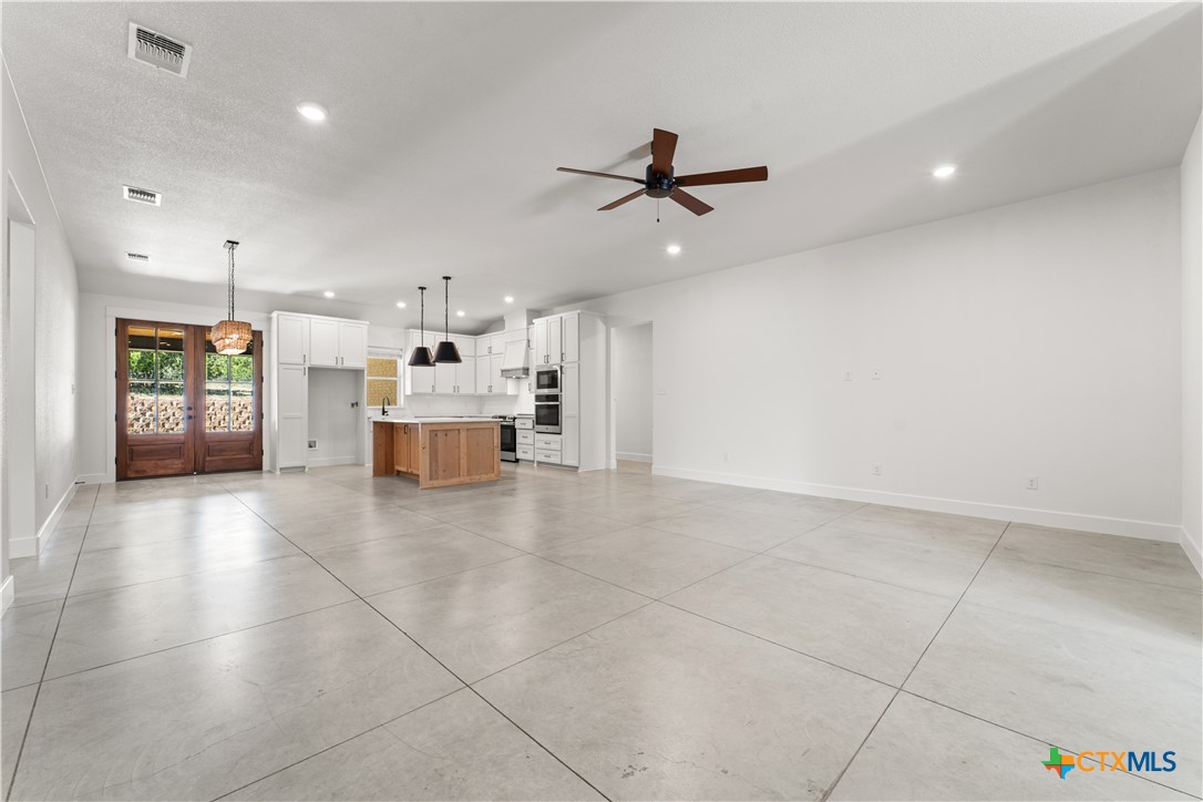 3244 Lois Lane Kempner, TX 76539 - Photo 11 of 35 a view of a kitchen with a stove and a window