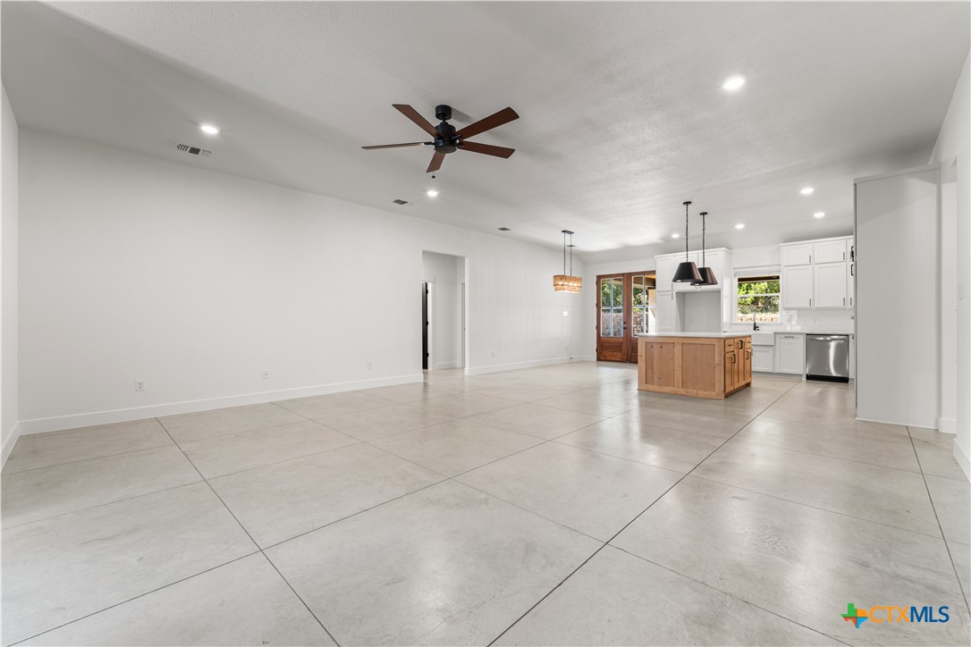 3244 Lois Lane Kempner, TX 76539 - Photo 12 of 35 a view of a kitchen with a sink and a refrigerator