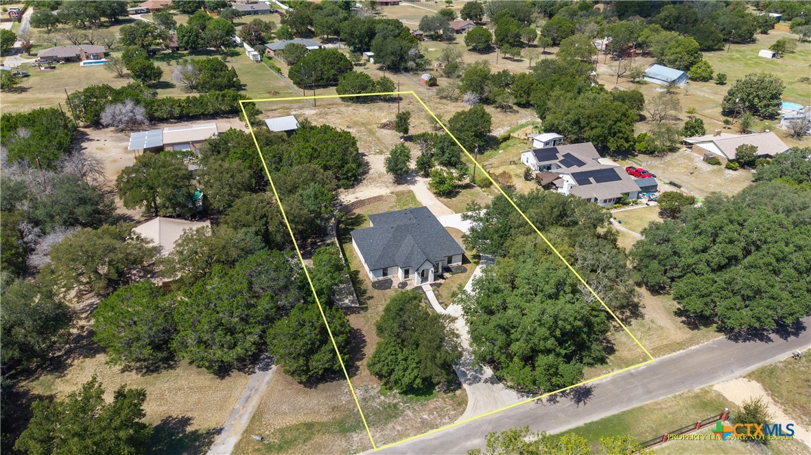3244 Lois Lane Kempner, TX 76539 - Photo 3 of 35 an aerial view of residential house with outdoor space and trees all around