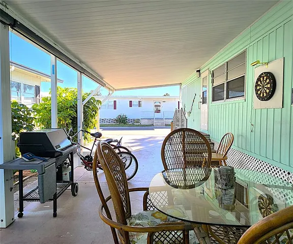 a view of a back yard of the wooden fence