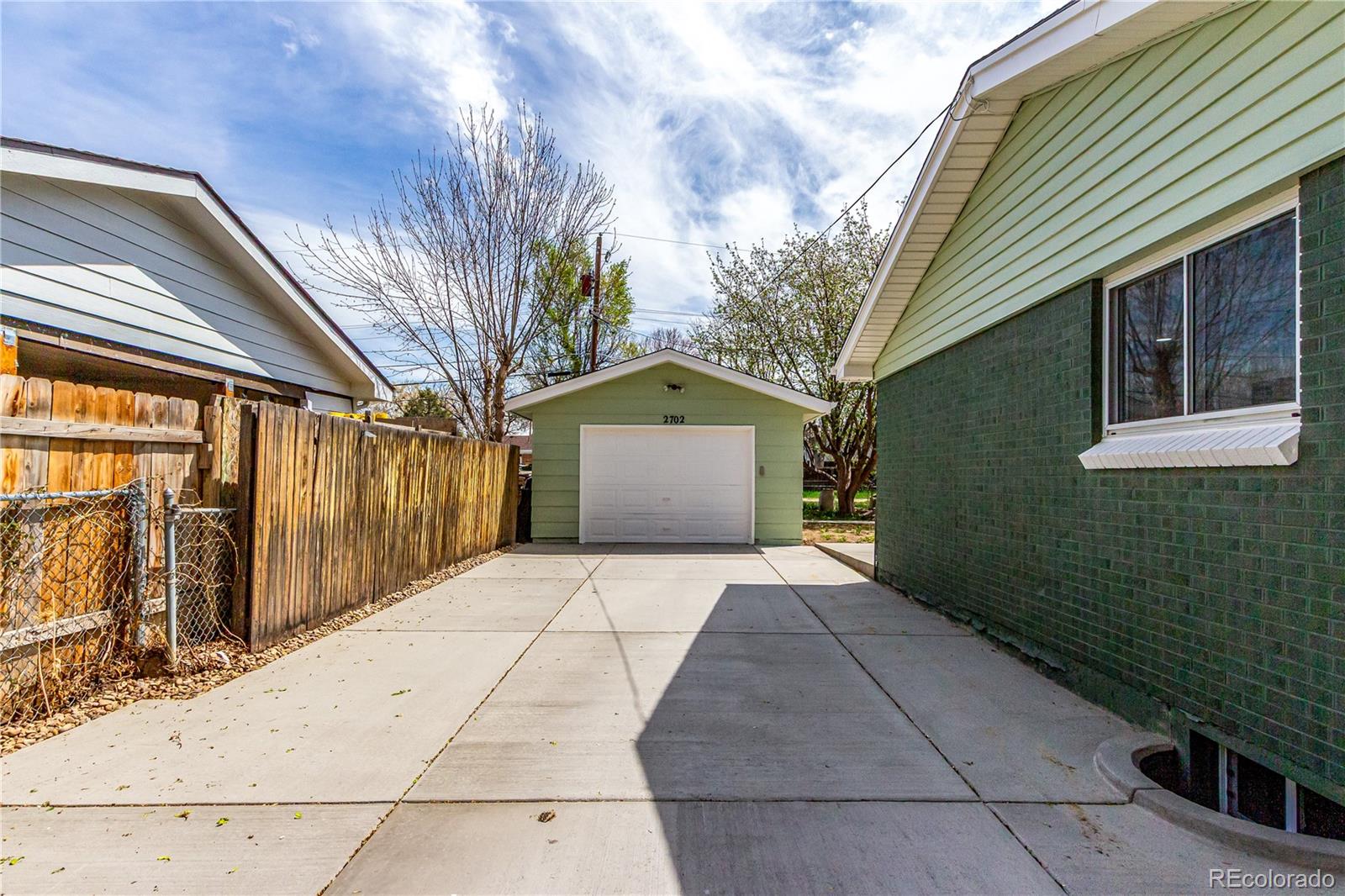 2702 Atchison Street Aurora, CO 80011 - Photo 18 of 18 a view of entrance gate of a house